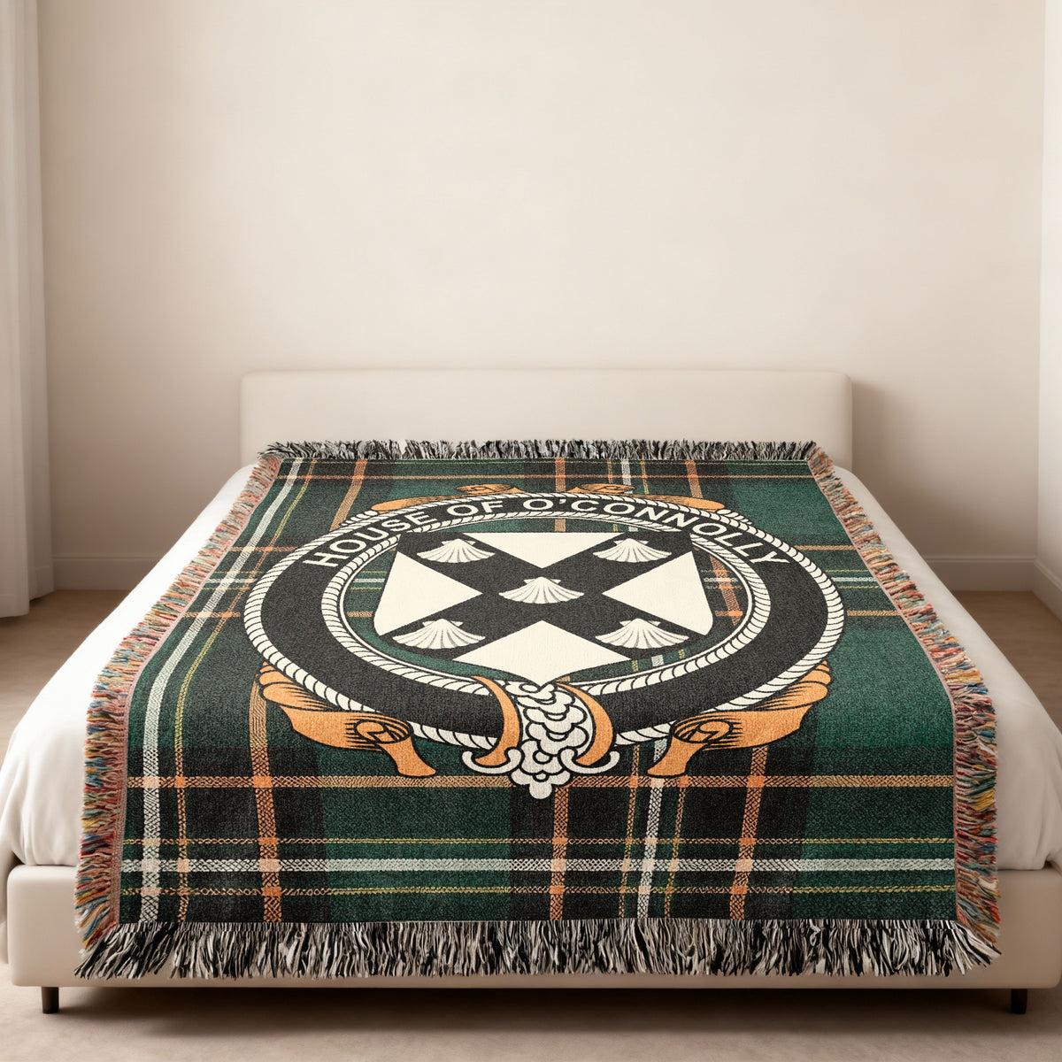 O'Connolly family crest emblem woven blanket displayed on a bed