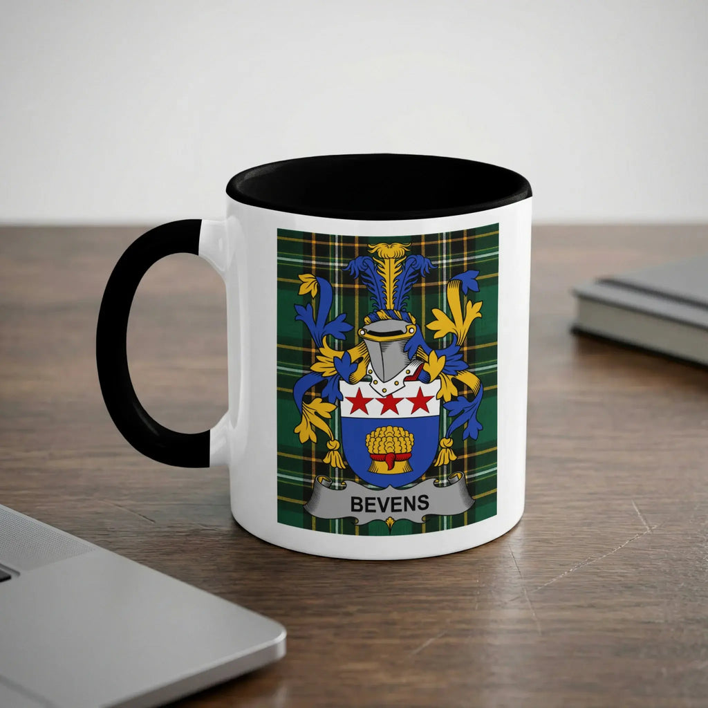 Bevens family crest on a white mug with black rim and handle.