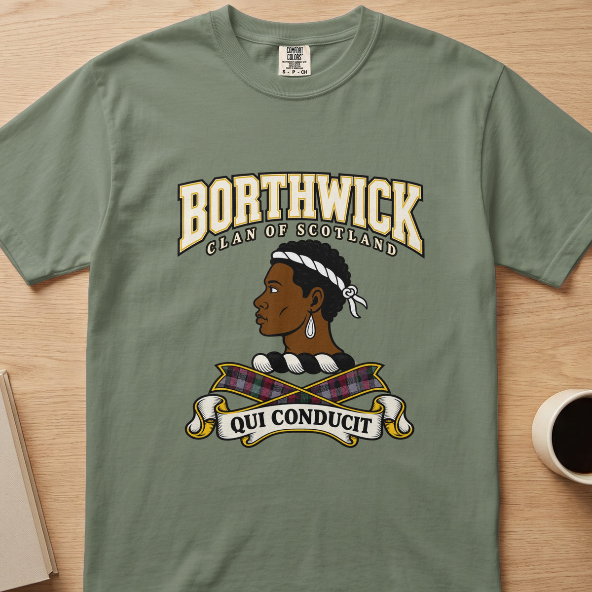 Borthwick clan crest with profile portrait on a sage green Comfort Colors T-shirt, front view
