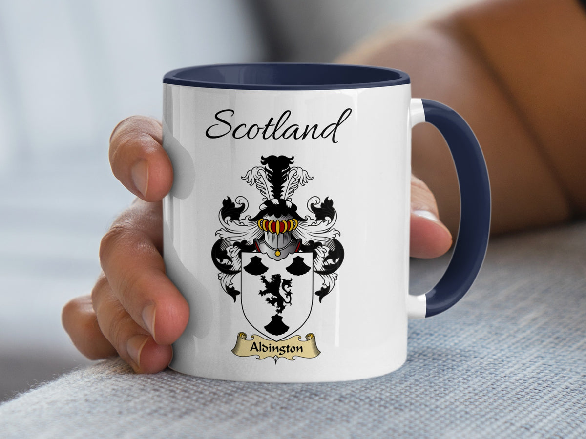 White Aldington heritage mug with navy handle and interior, displaying “Scotland” and the colourful family emblem.