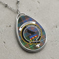 MacDonnell clan crest badge on tartan, with text "CRAGAN AN FHITHICH".