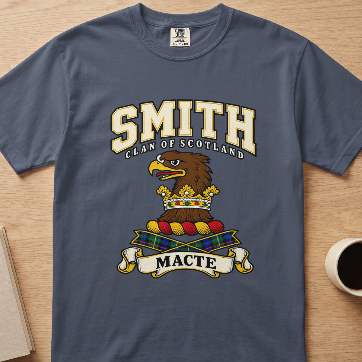 Smith brown eagle-head crest with gold accents graphic on a slate blue Comfort Colors T-shirt, front view
