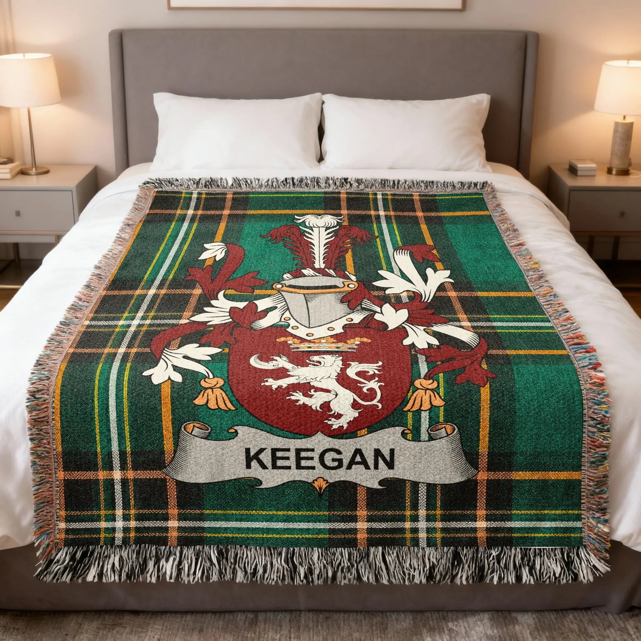 Keegan family crest on a green plaid blanket on a bed.