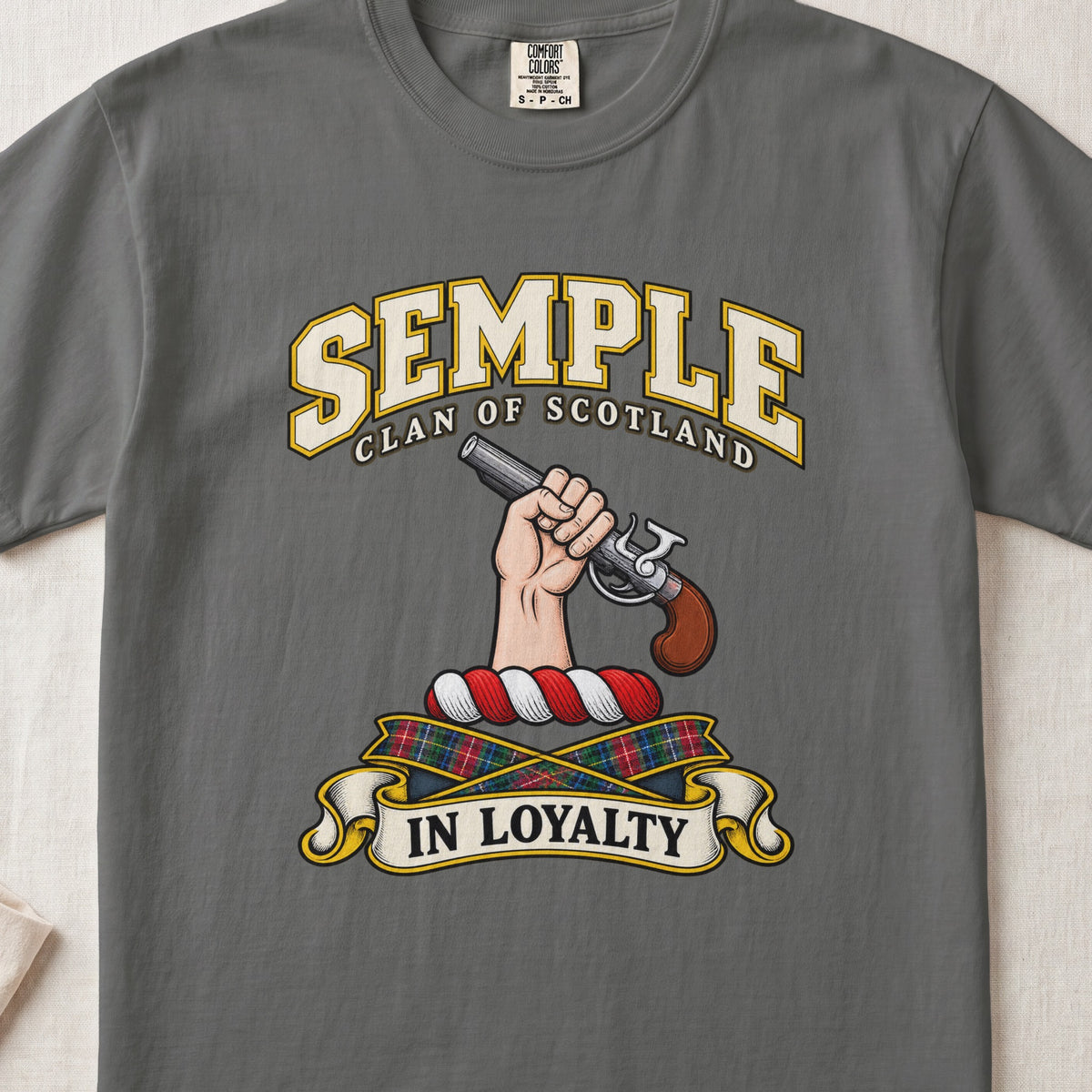 Semple Scottish clan T-shirt in Pepper, front view with a hand holding a flintlock pistol and motto banner.