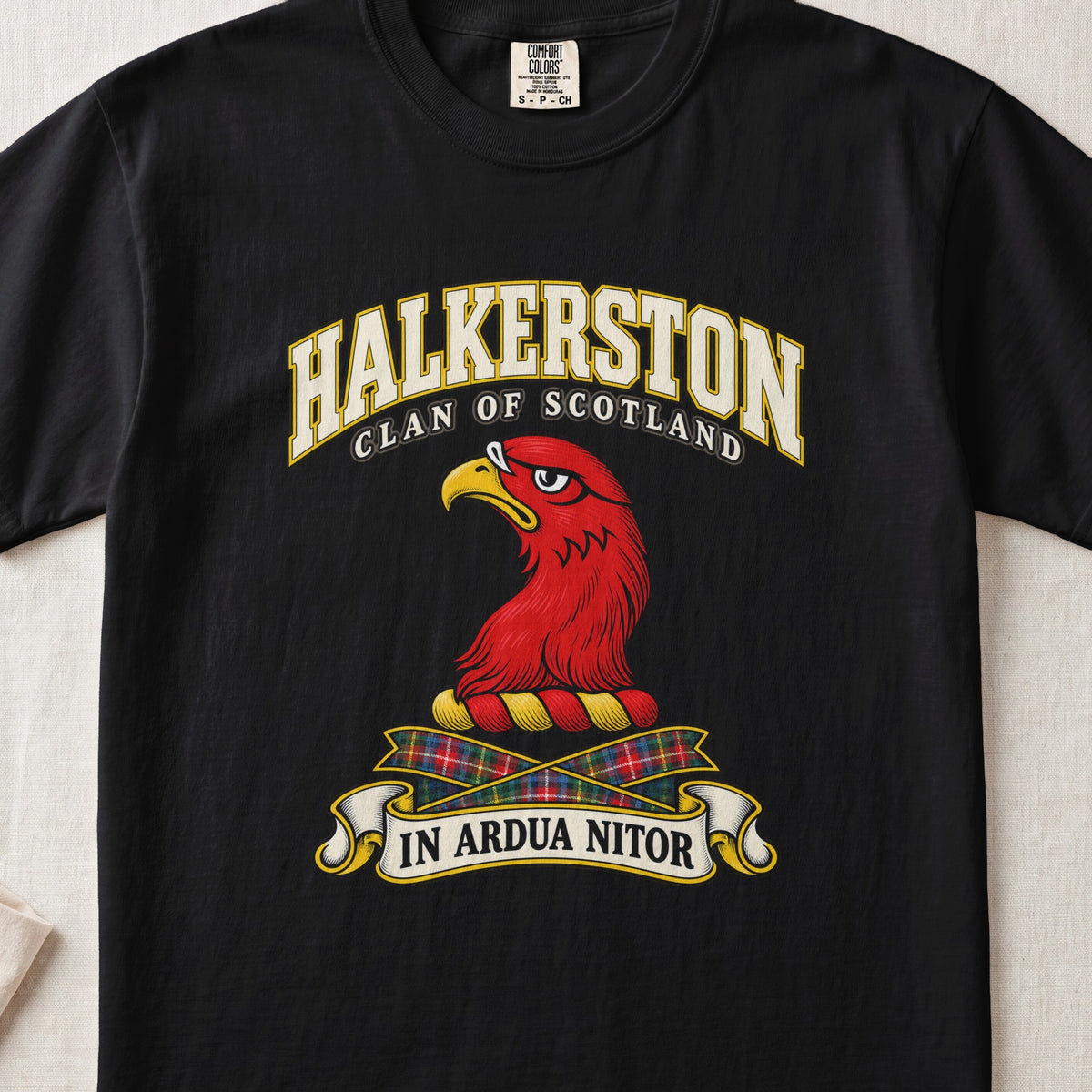 Halkerston Scottish clan T-shirt in Black, front view with a red bird head with a golden beak and motto banner.