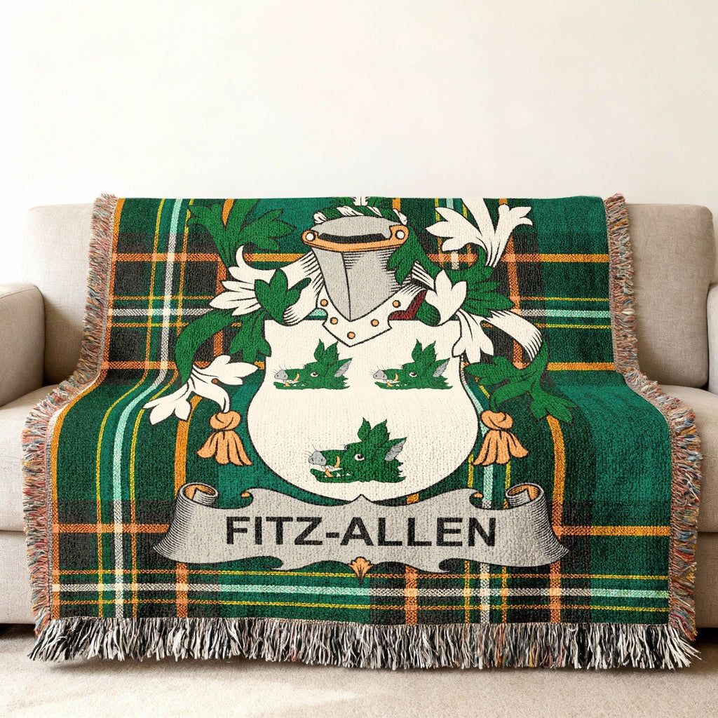 Green tartan blanket with Fitz-Allen coat of arms.
