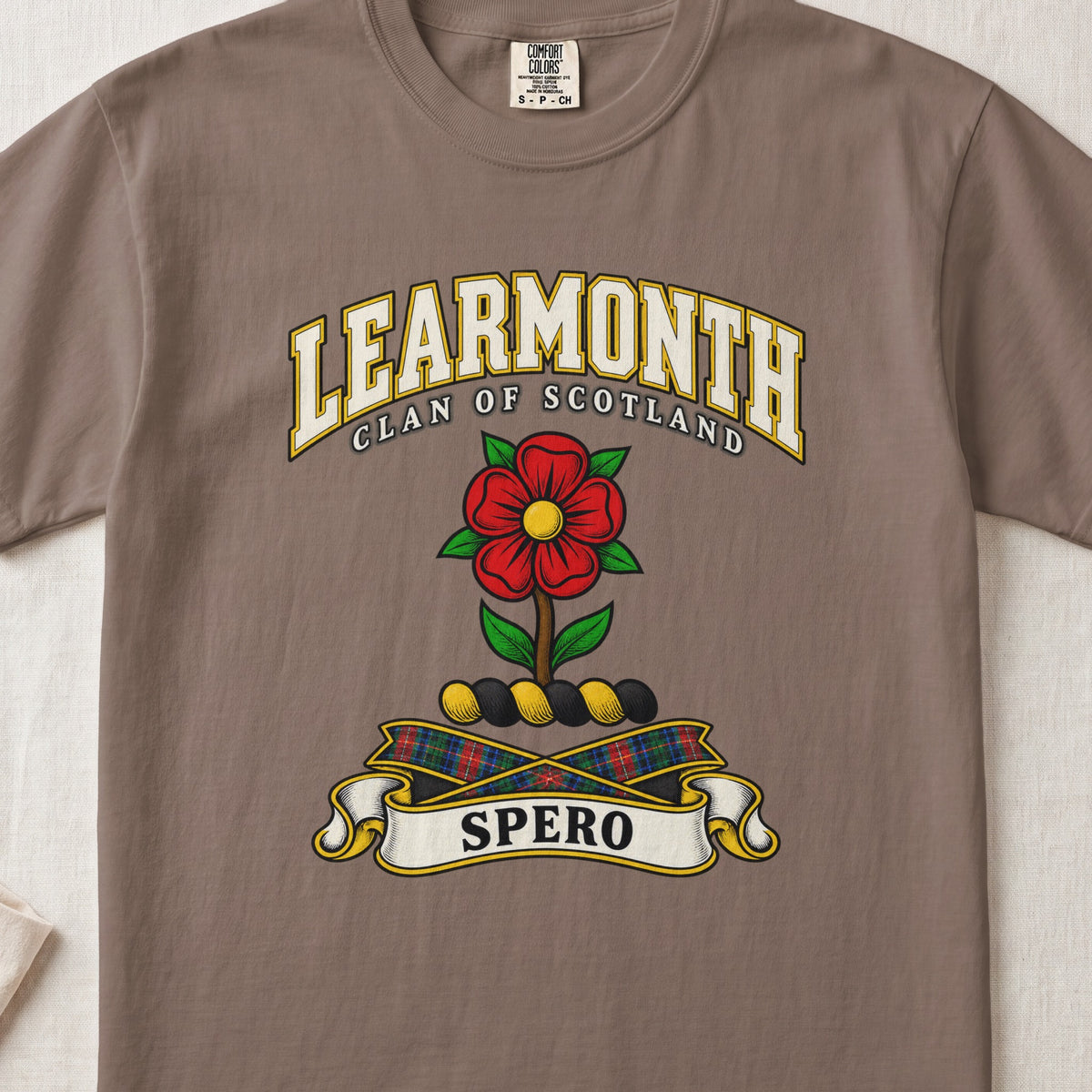 Learmonth Scottish clan T-shirt in Espresso, front view with a red rose with green leaves and motto design.