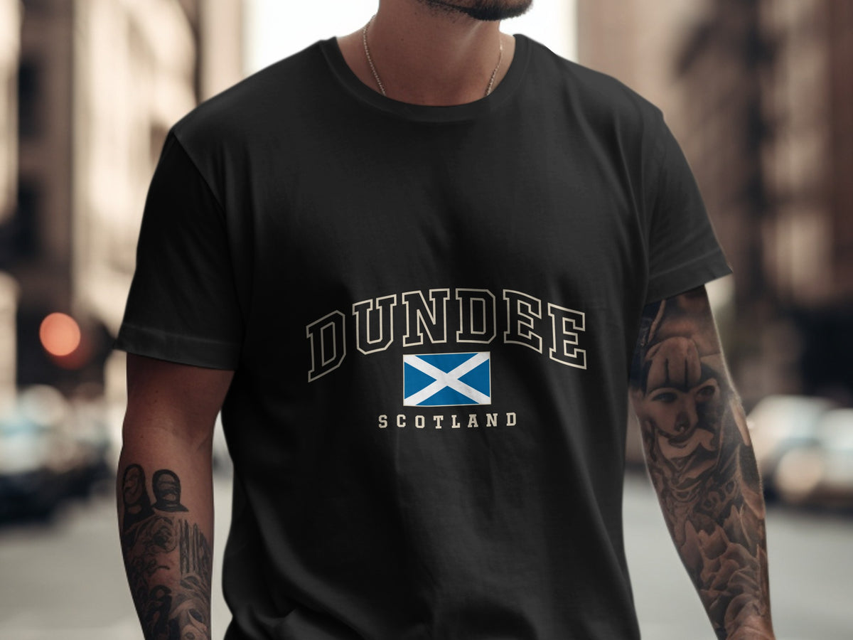 Model wearing the Black Dundee Scotland Comfort Colors T-shirt with the Scottish Saltire