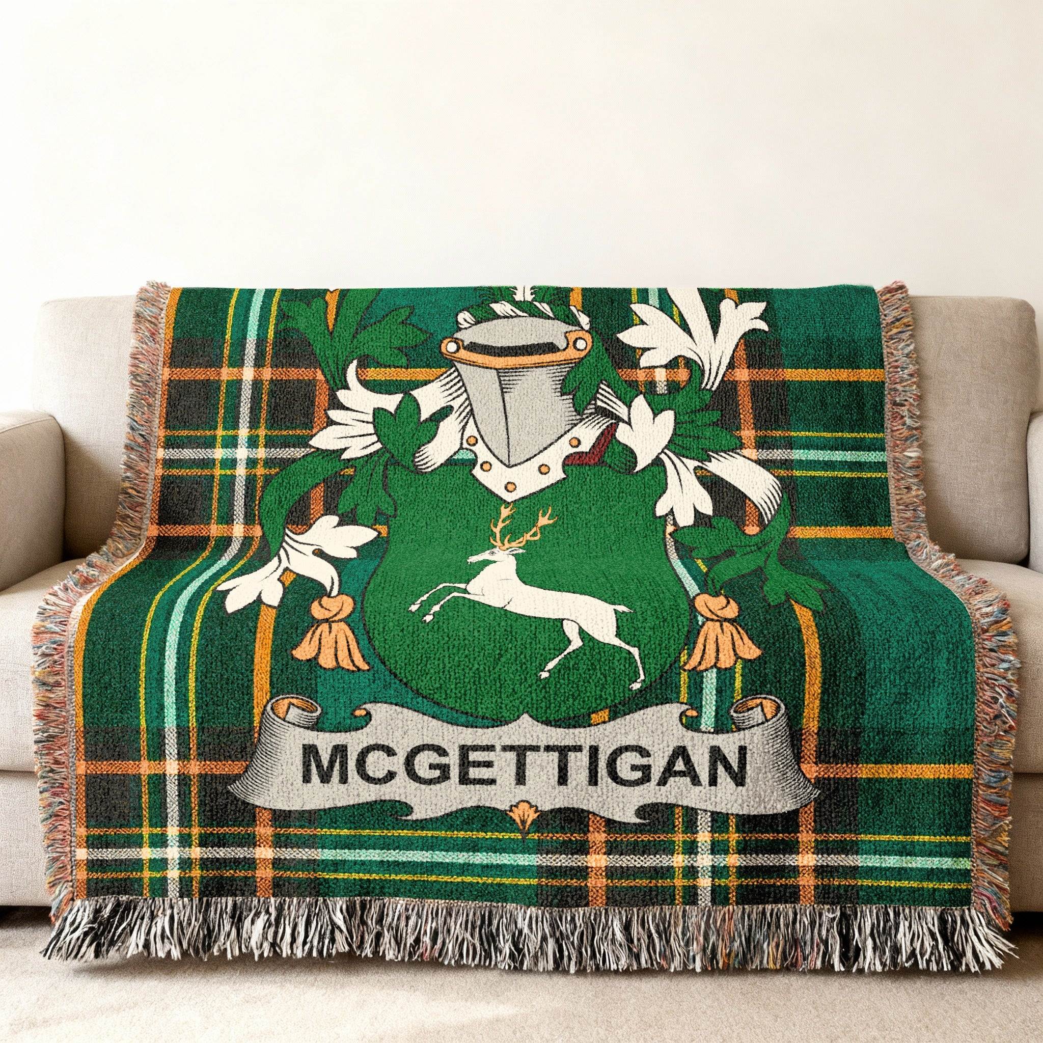 McGETTIGAN family crest on green plaid throw blanket.