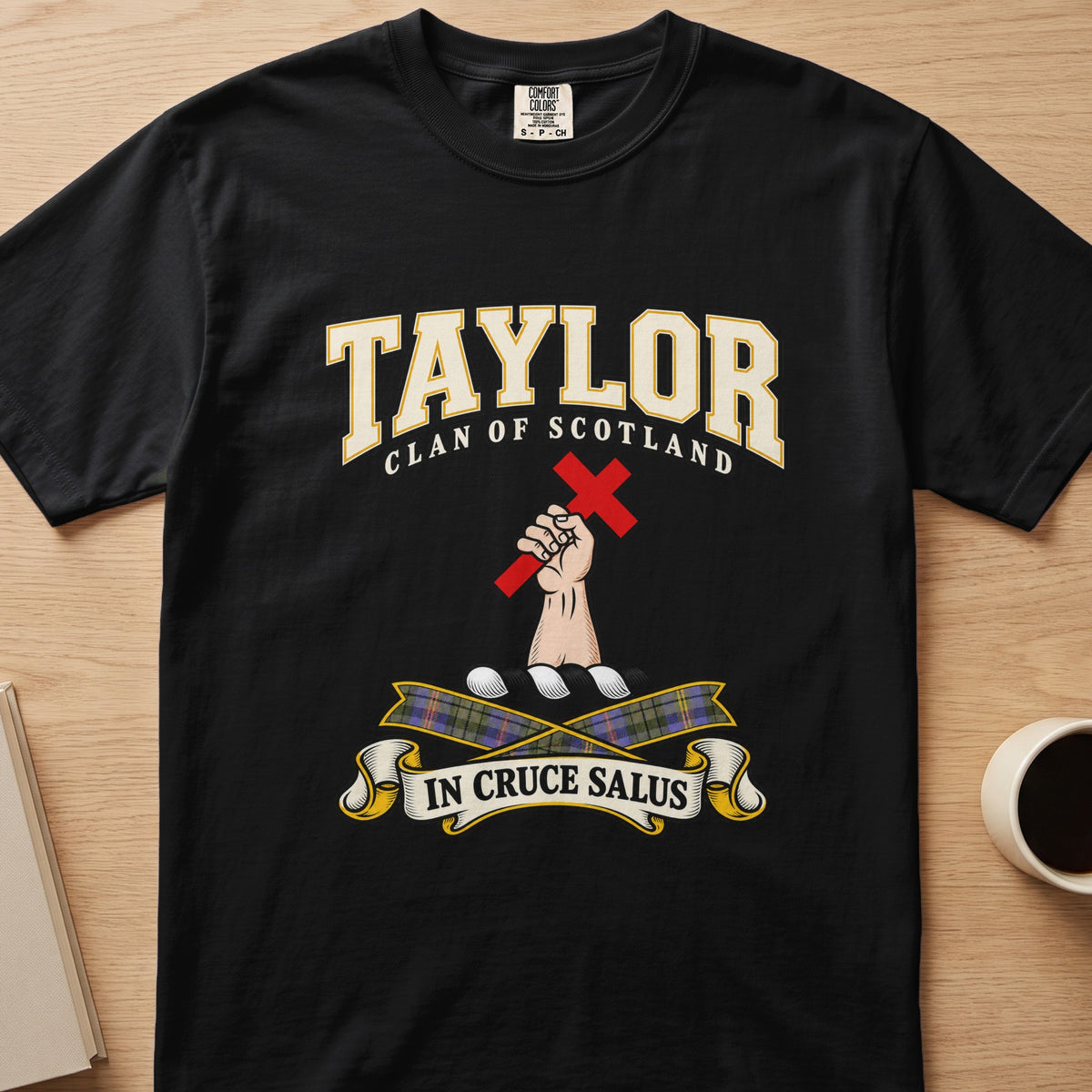 Taylor clan T-shirt in black, front view with hand holding a red cross