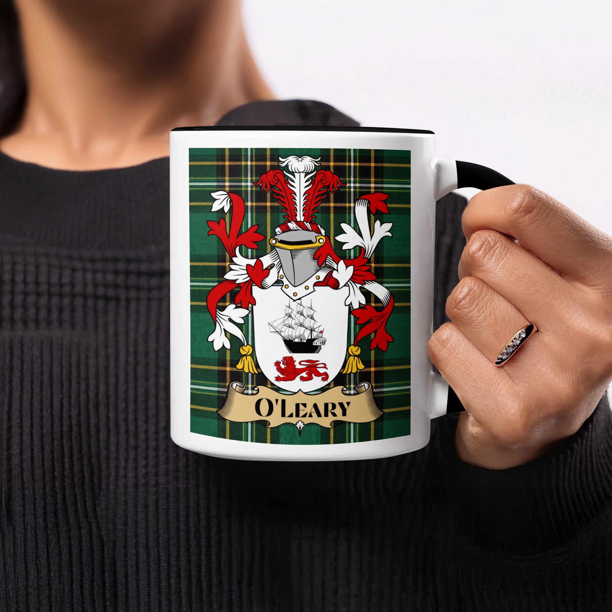 O'Leary Irish family crest tartan mug held in hand