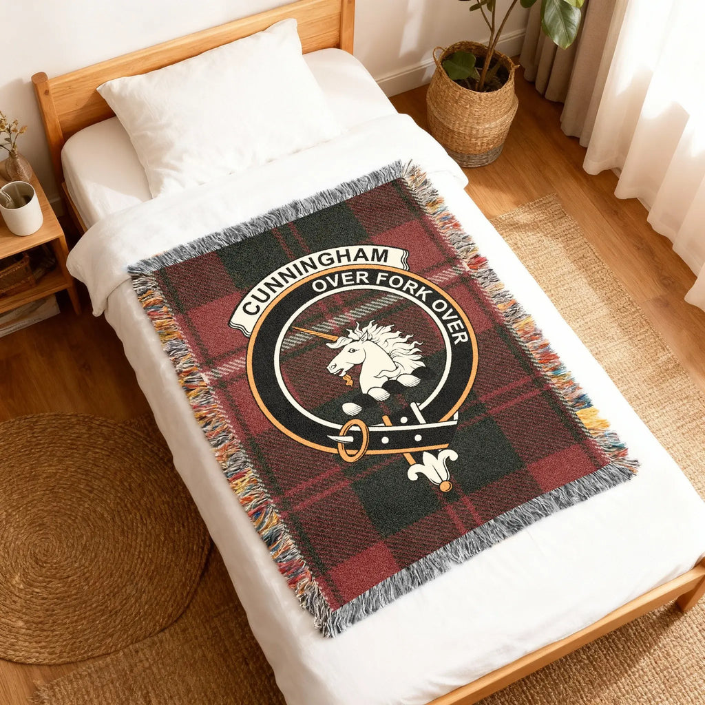 Cunningham Over Fork Over plaid design woven blanket folded — unicorn crest on cotton