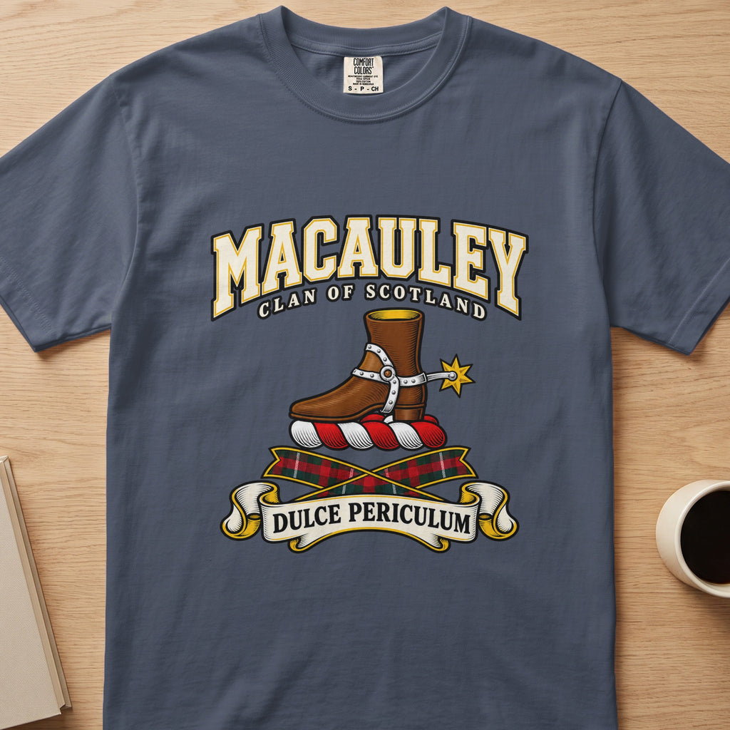 MacAuley brown boot and gold spur crest graphic on a slate blue Comfort Colors T-shirt, front view
