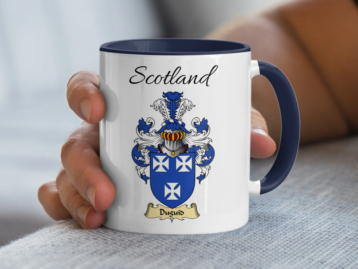 White Duguid Scottish mug with navy trim, showing the family emblem and Scotland text