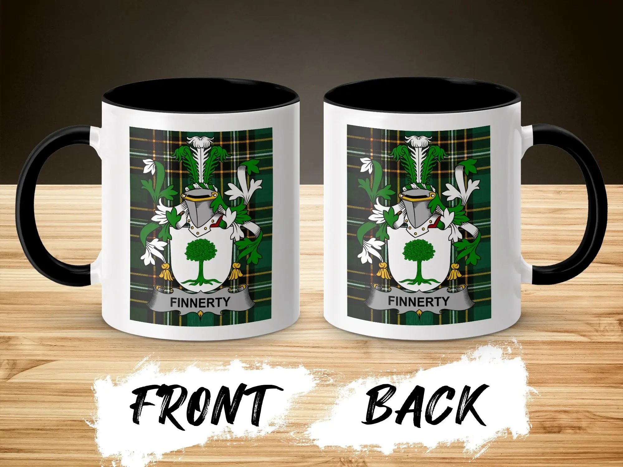Two white mugs with black rims and handles, displaying a green and white crest with "FINNERTY" text.