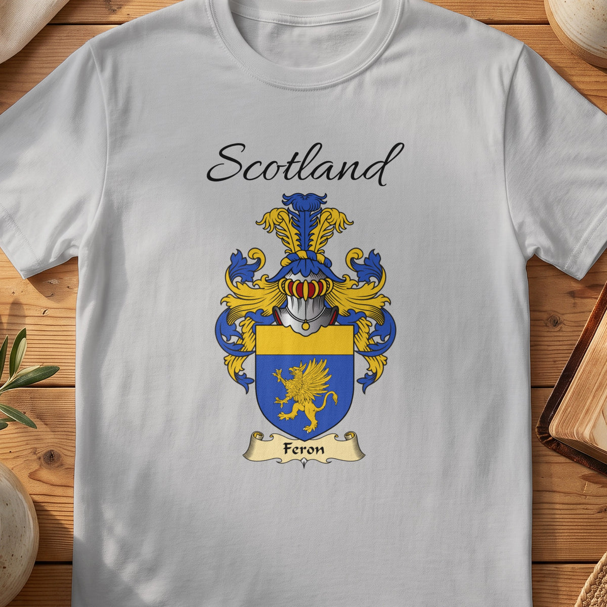 Sport Grey Feron Scottish family shield T-shirt featuring a gold winged creature on blue