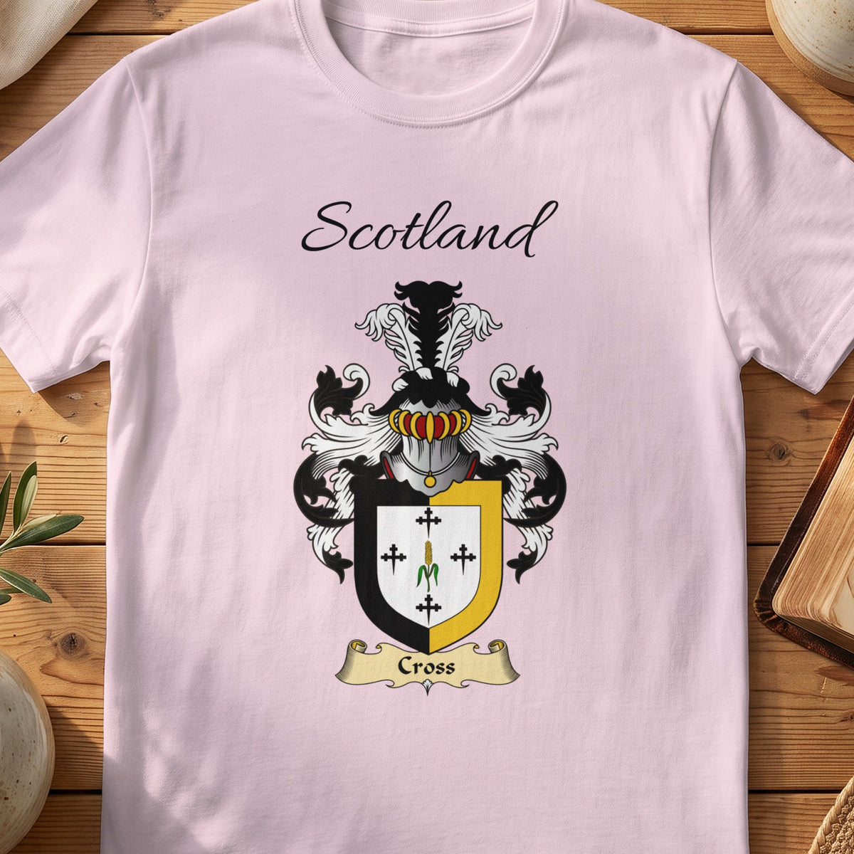 Light Pink Cross Scottish family shield T-shirt featuring small black crosses inside a gold border