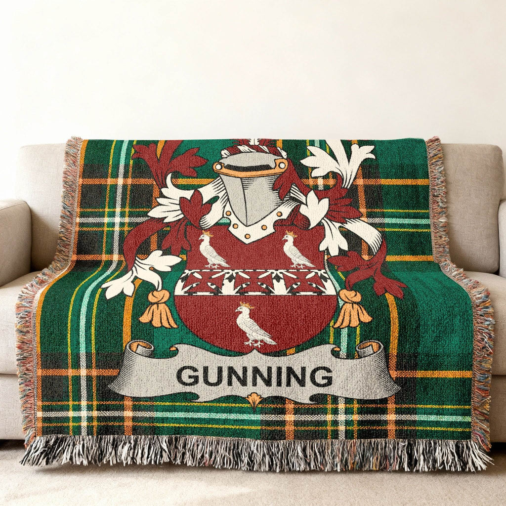 Green tartan blanket with Gunning family crest.