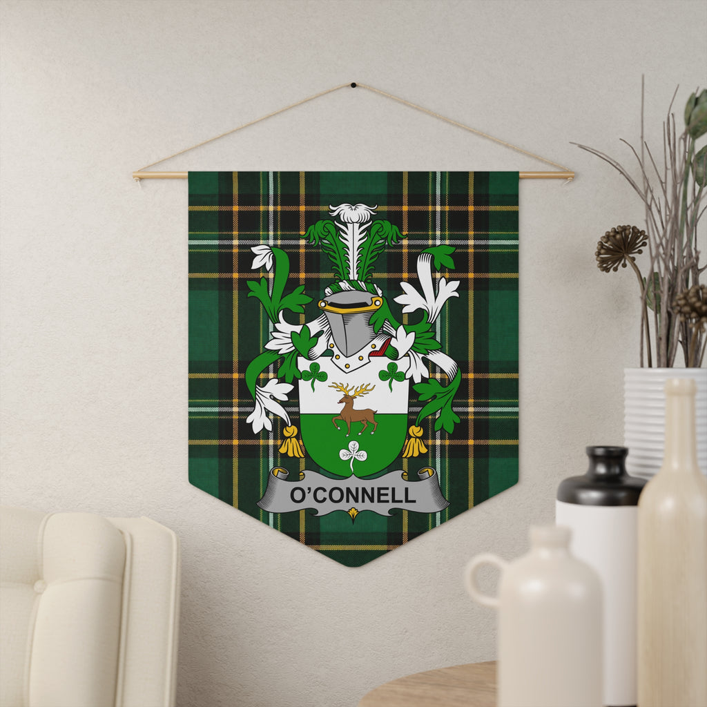 O'Connell family crest on green tartan banner hanging on wall.
