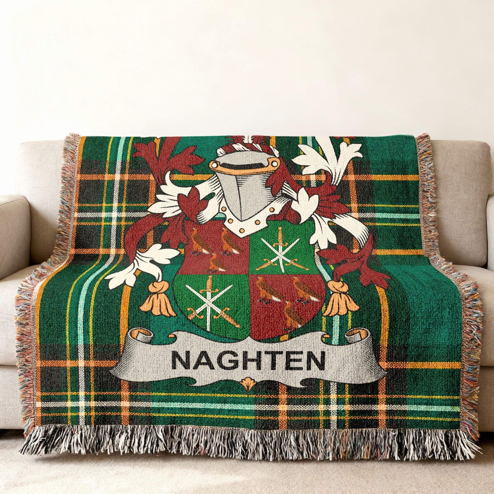 Green tartan throw blanket with Naghten family crest.