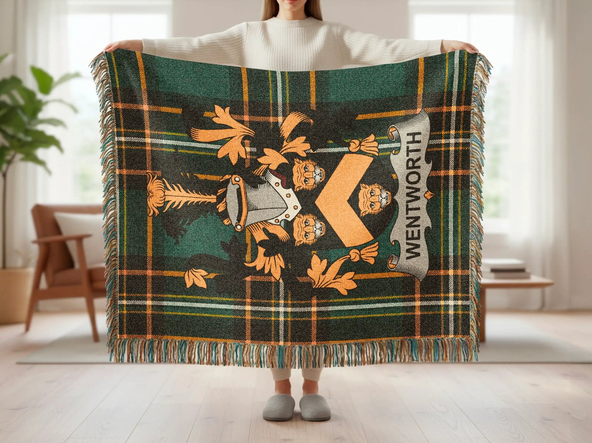 Tartan throw blanket with Wentworth crest featuring lion rampant and shield.