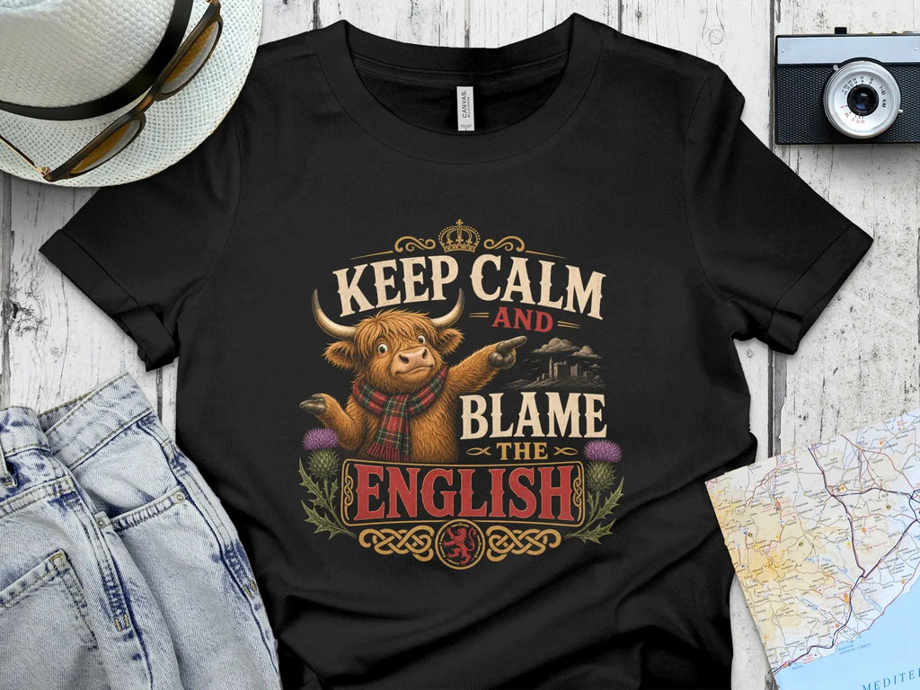 Black t-shirt with "Keep Calm and Blame the English" text and Scottish thistle design.