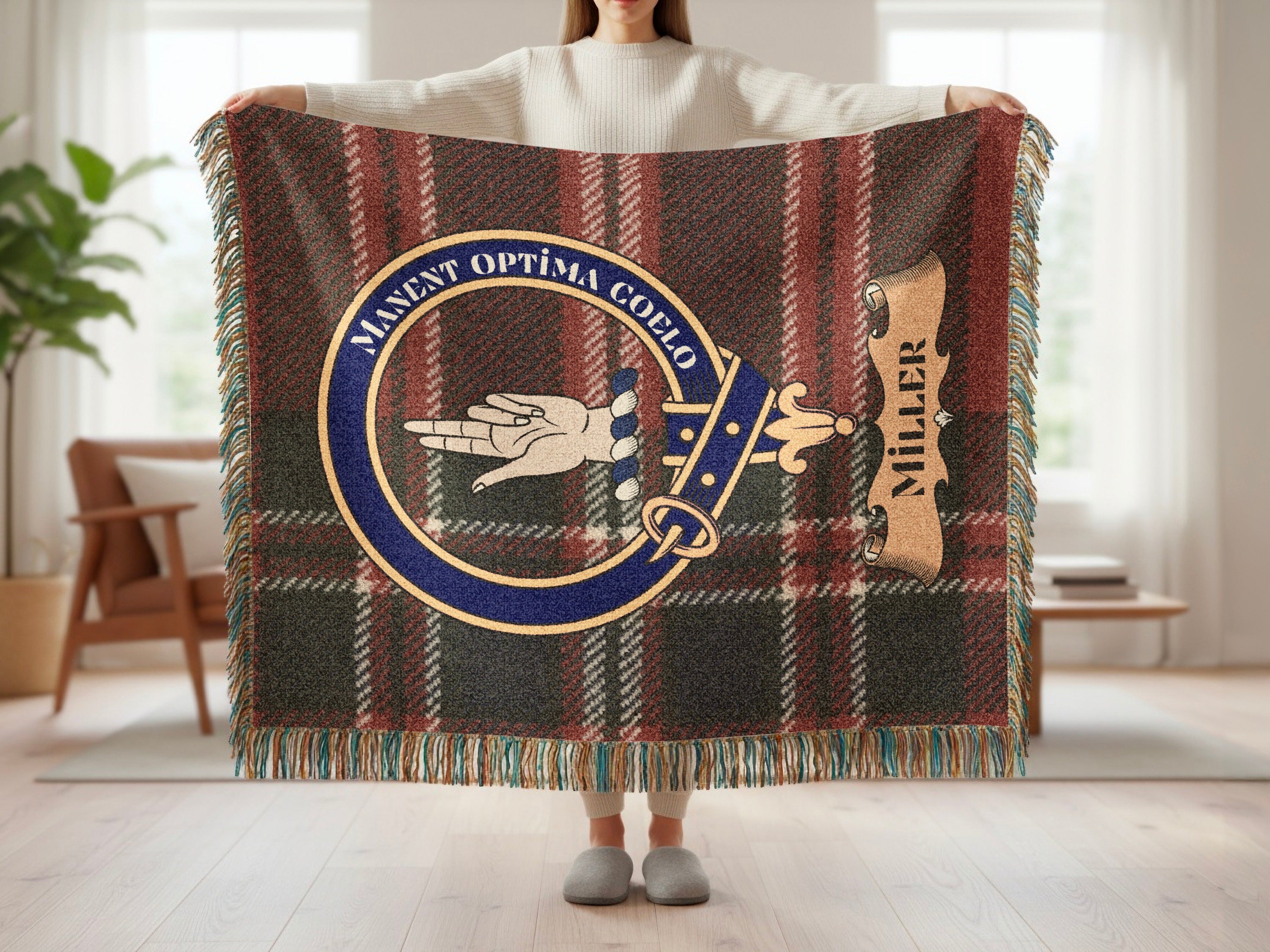 Miller clan crest with Manent Optima Coelo motto on tartan woven blanket