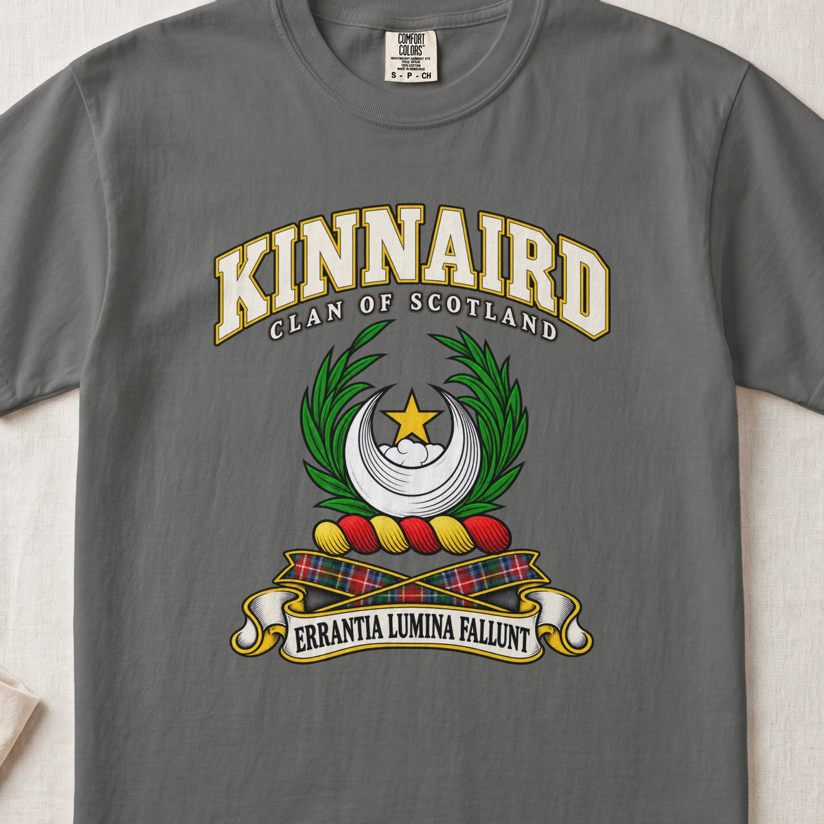 Kinnaird Scottish clan T-shirt in Pepper, front view with a silver crescent, gold star and green leafy branches and motto design.