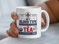 Mug with "My Blood Type is Tea" text and Scottish heritage design.