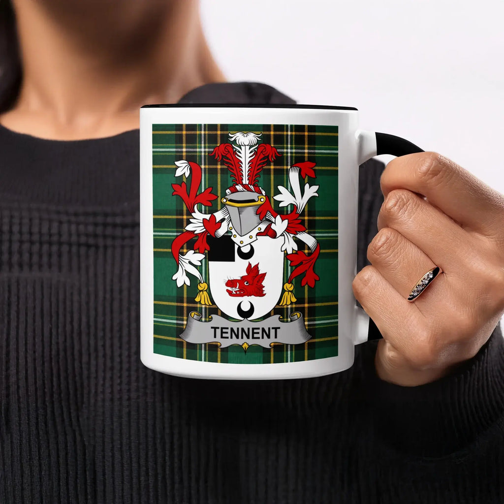 Mug with the Tennent family crest on a green plaid background.