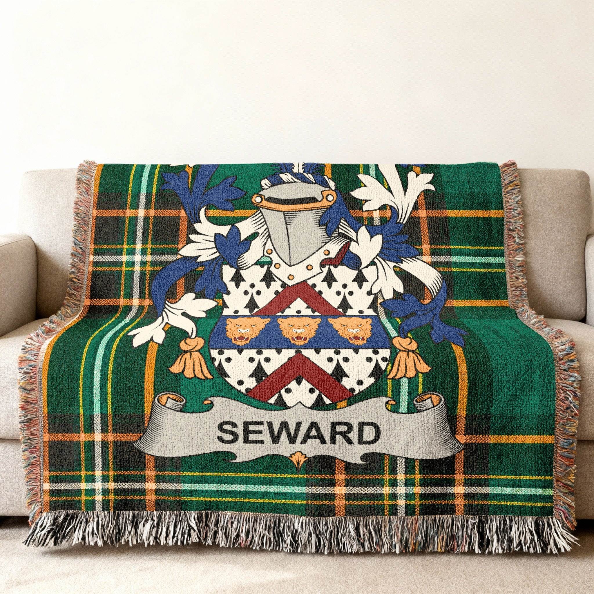 Woven plaid throw blanket with a SEWARD family crest.