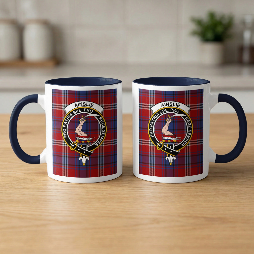 Pair of Ainslie Scottish family crest 11 oz mugs with navy accents and a tartan background