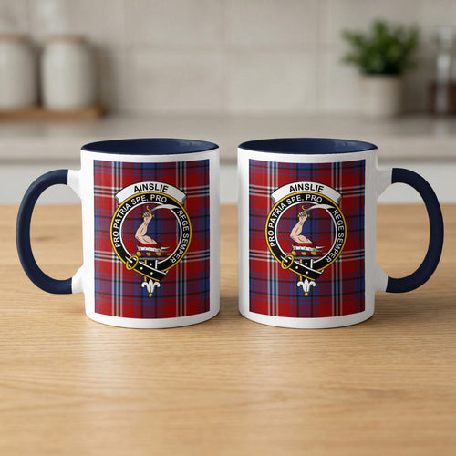 Pair of Ainslie Scottish family crest 11 oz mugs with navy accents and a tartan background