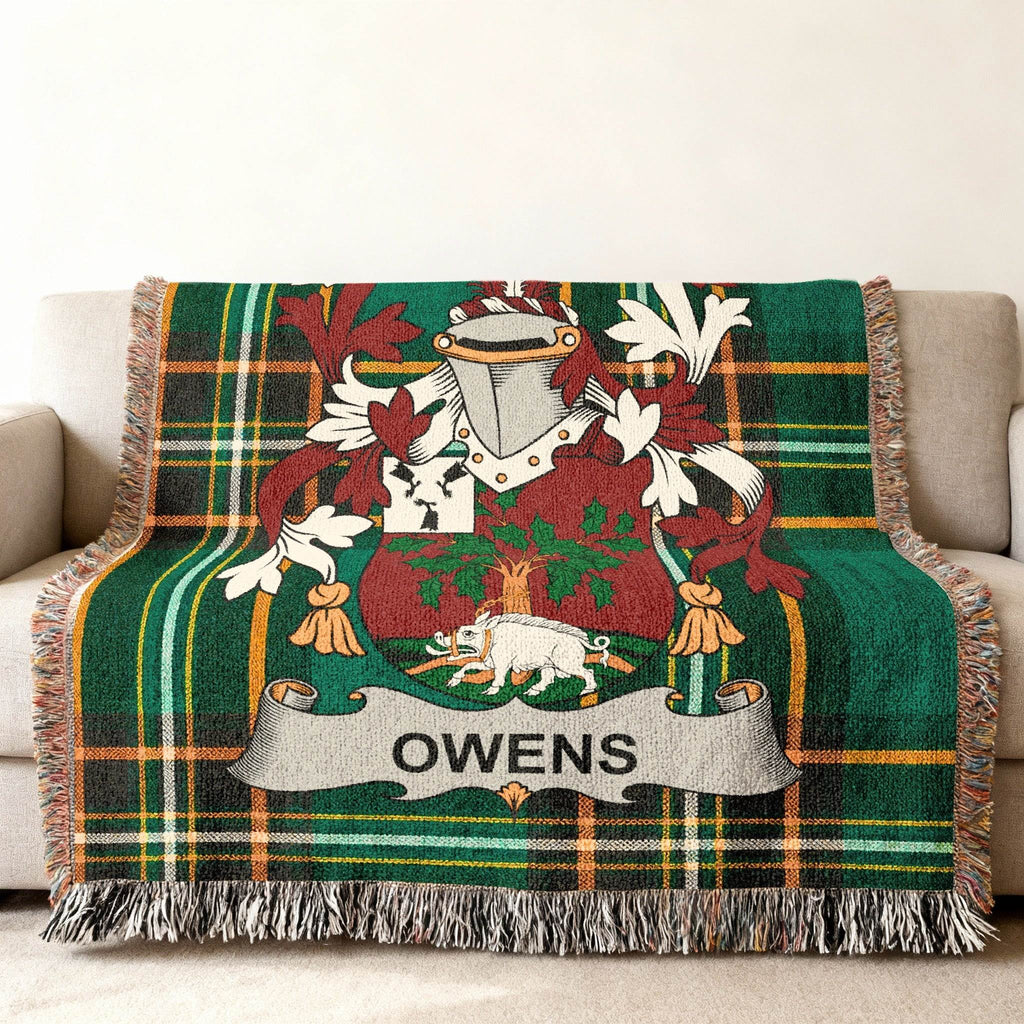 Green plaid blanket with the Owens family crest.