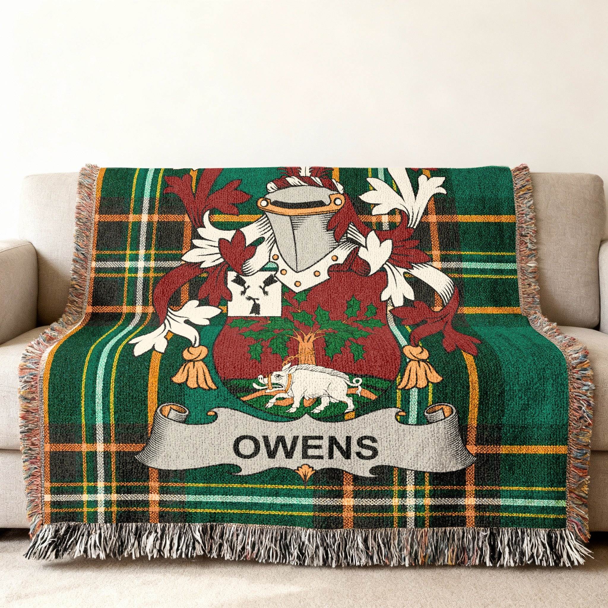 Green plaid blanket with the Owens family crest.