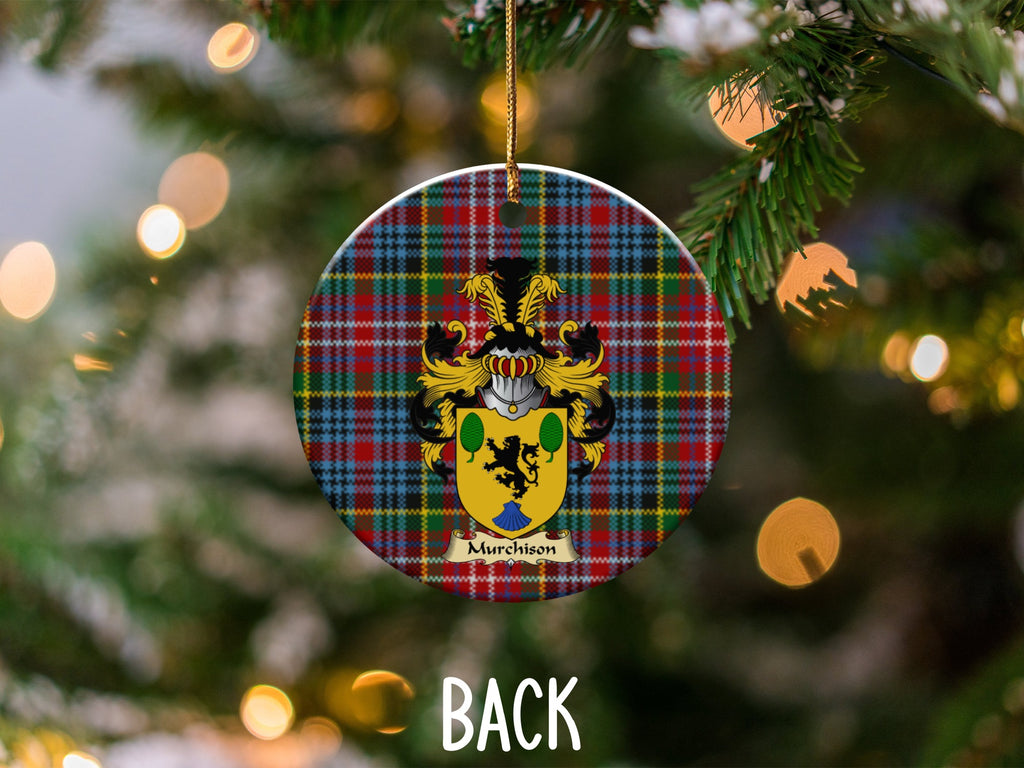 Murchison ceramic ornament detail showing a double-sided family shield on a Caledonia tartan background