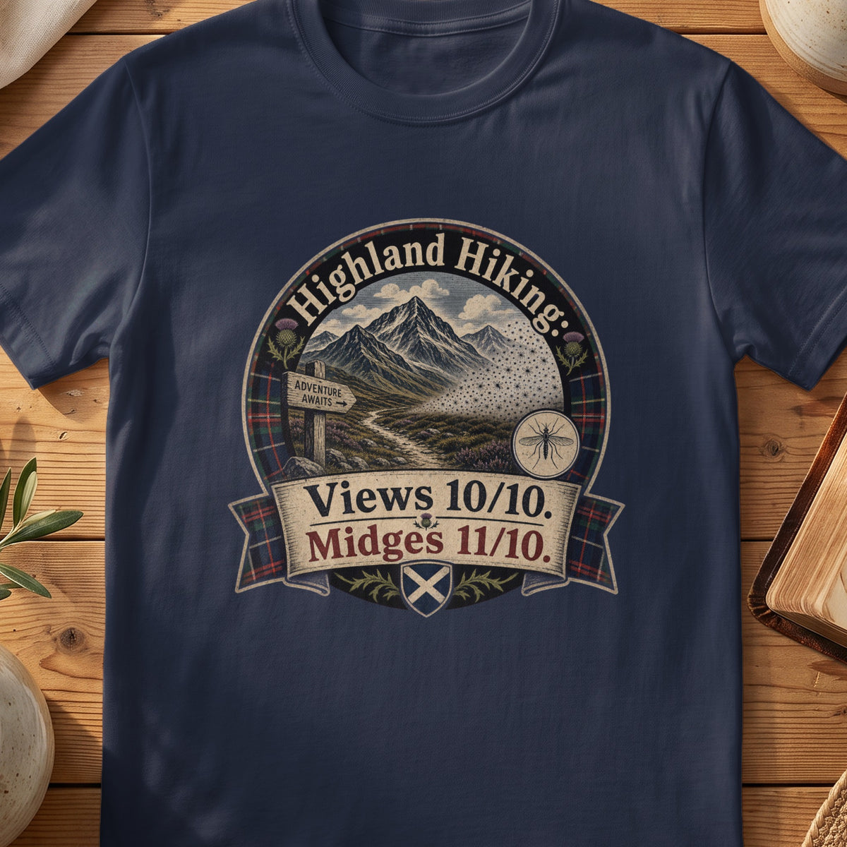 Navy Gildan 64000 unisex T-shirt flatlay with Highland Hiking Midges Scottish graphic design