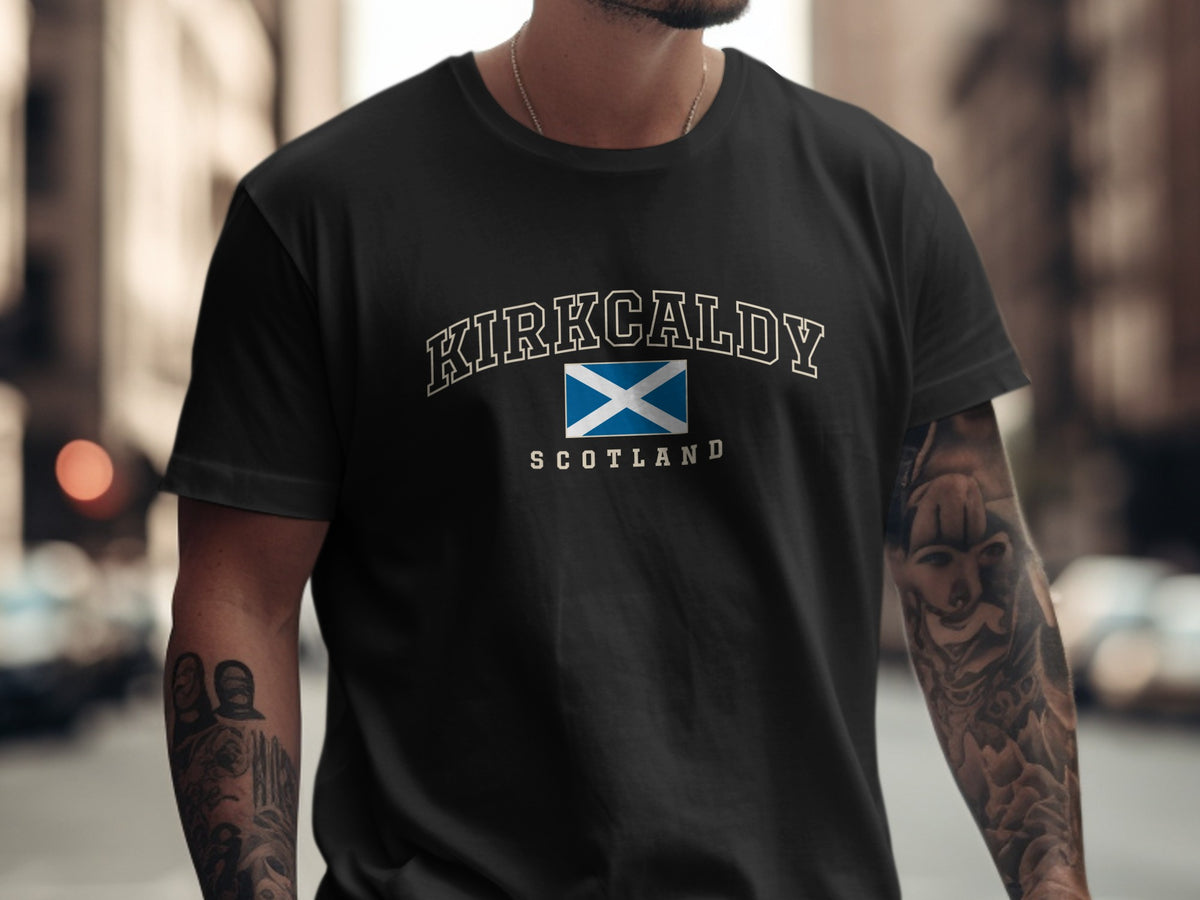 Model wearing the Black Kirkcaldy Scotland Comfort Colors T-shirt with the Scottish Saltire