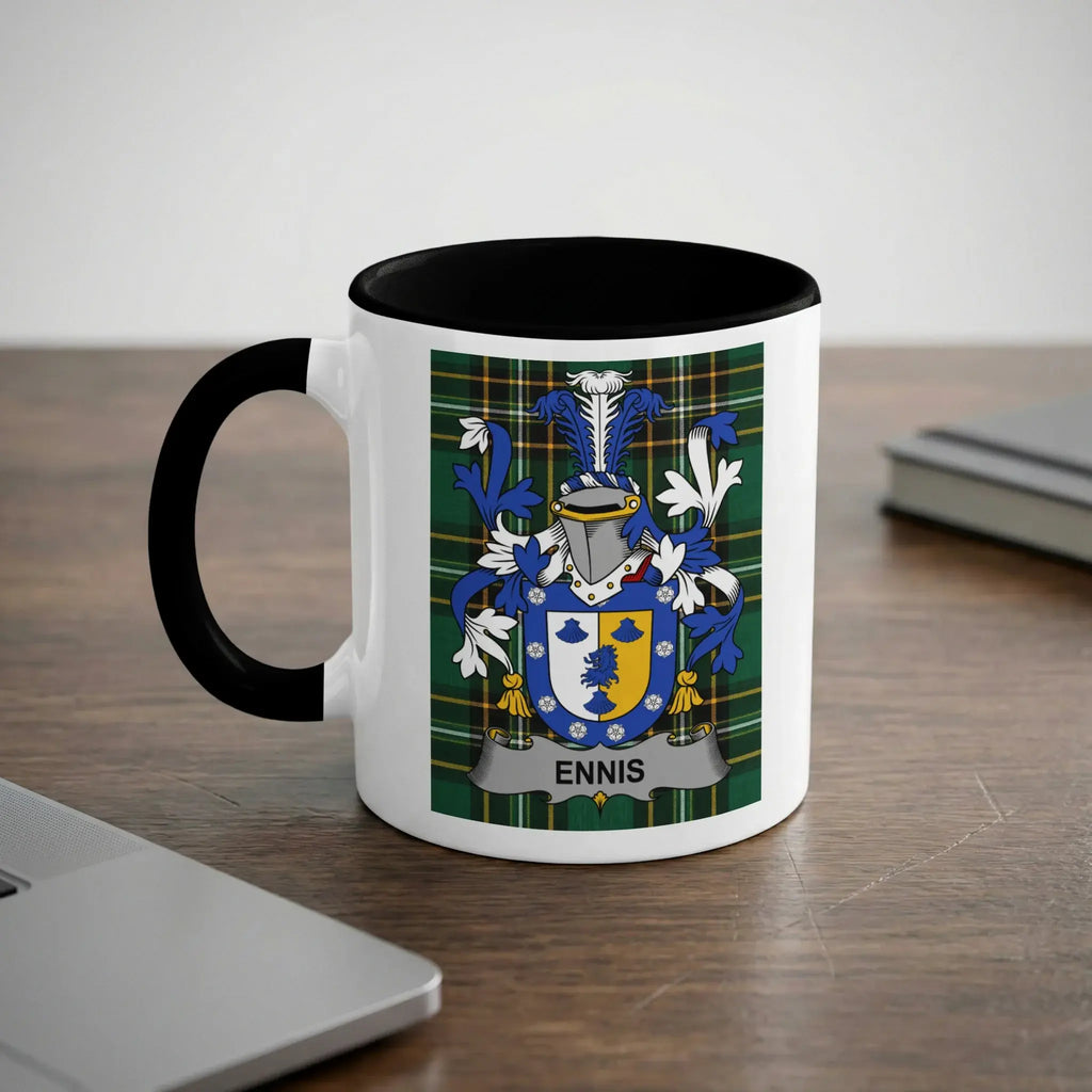 White mug with black rim featuring the Ennis family crest on a tartan background.