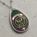 Carnegie clan Scottish tartan necklace with clan crest and Dread God motto on tartan background