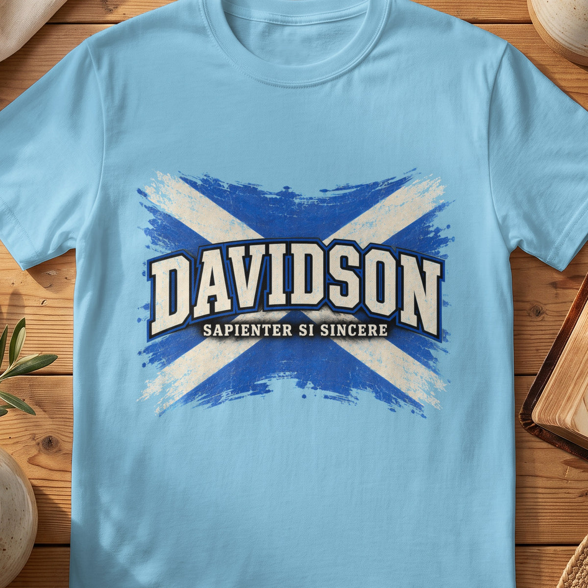 Davidson Scottish Saltire T-shirt in Sky, with distressed blue and cream flag and “Sapienter Si Sincere” lettering.