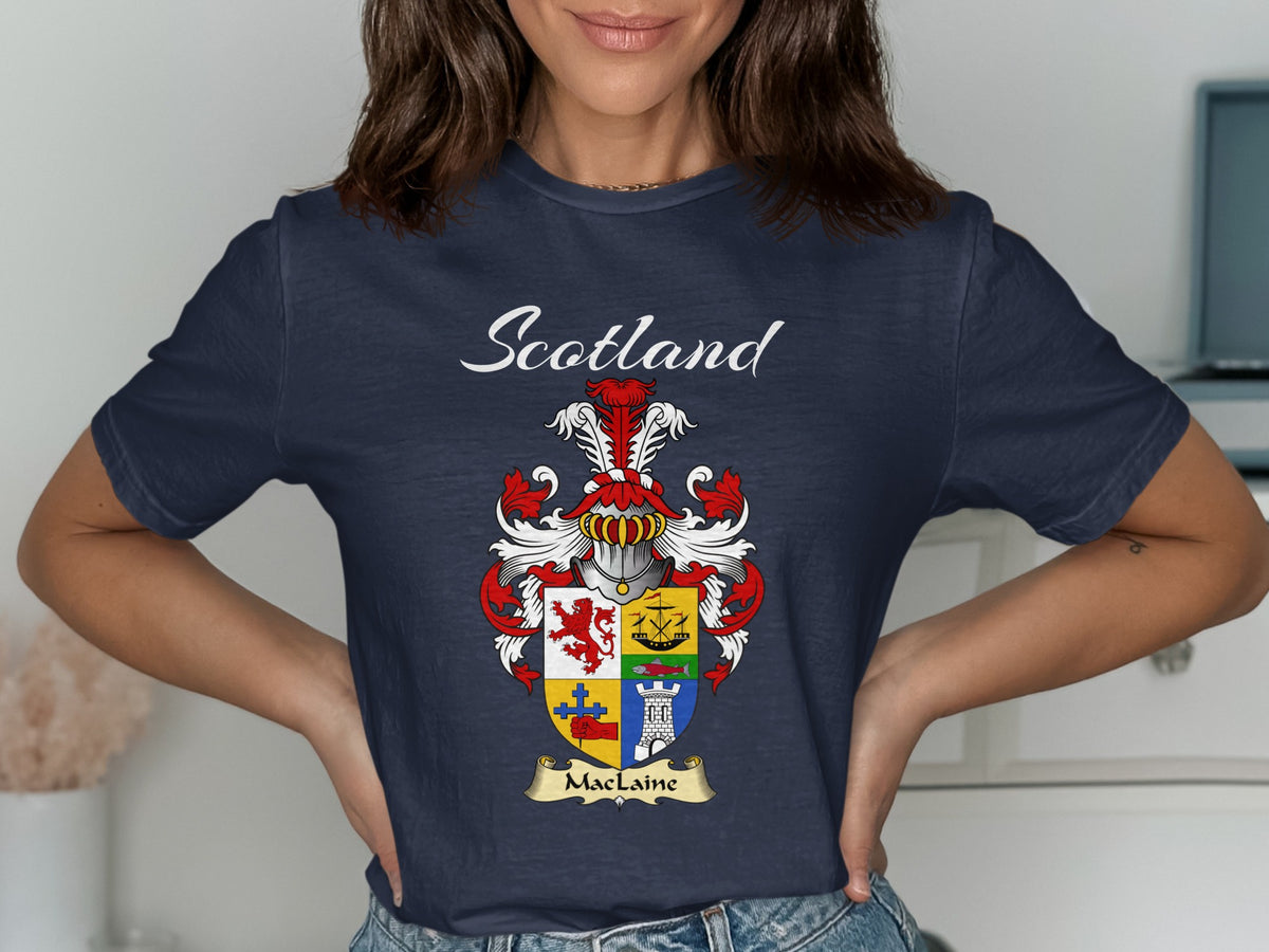 Model wearing a navy MacLaine T-shirt featuring a quartered shield with an anchor and tower