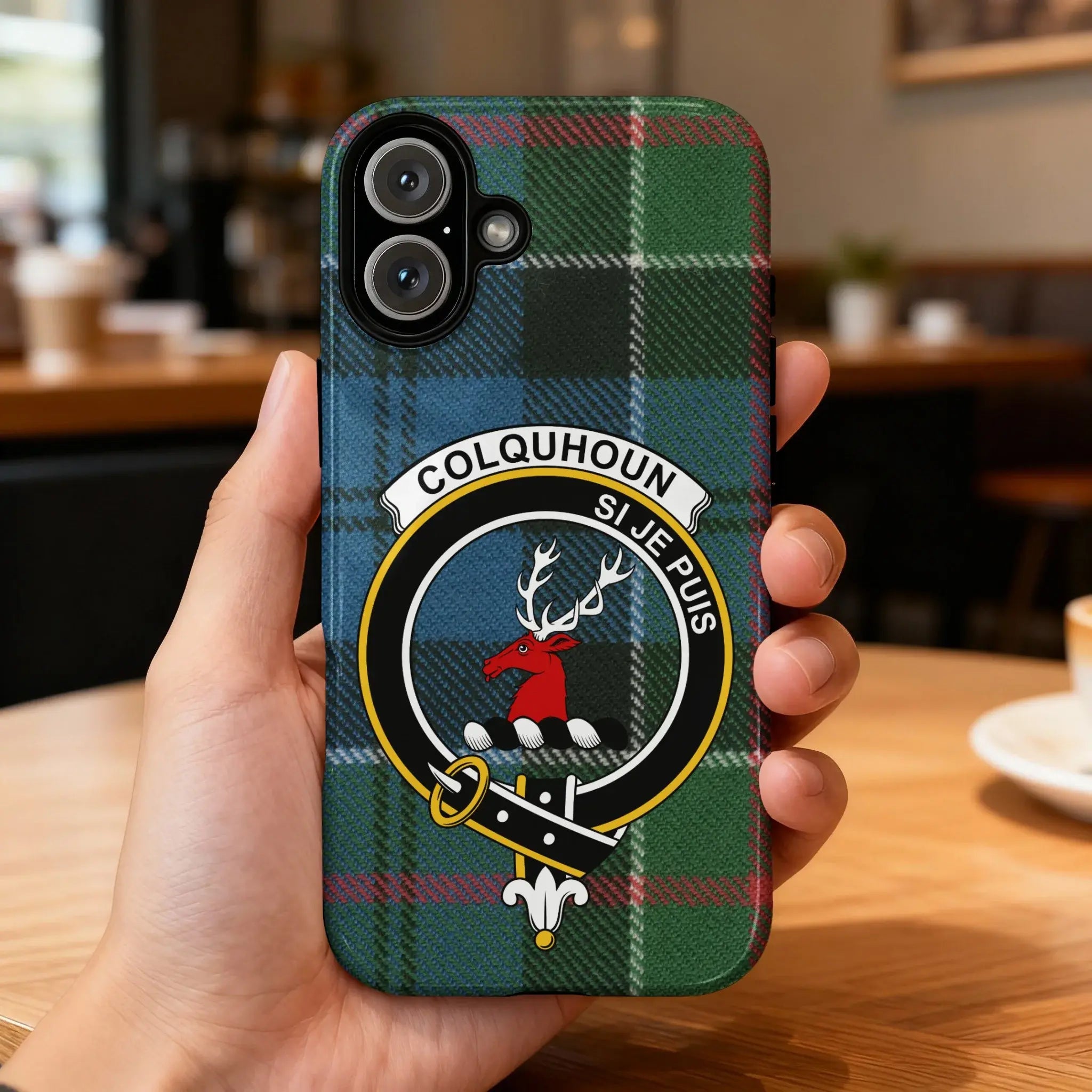 Colquhoun clan crest tartan phone case on iPhone — edge-to-edge design with stag crest and Si Je Puis
