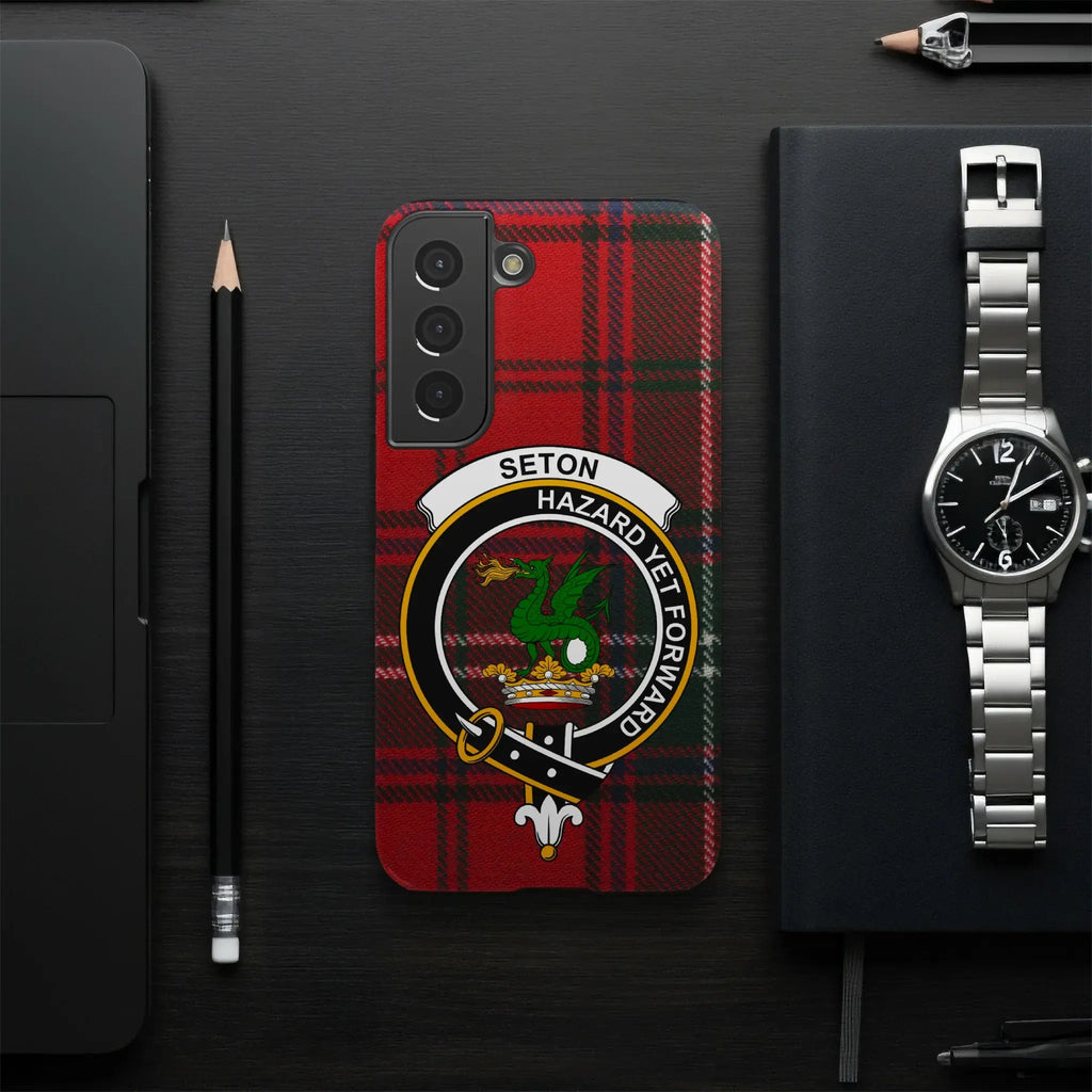 Seton Hazard Yet Forward clan tartan phone case — edge-to-edge print, slim glossy build on iPhone