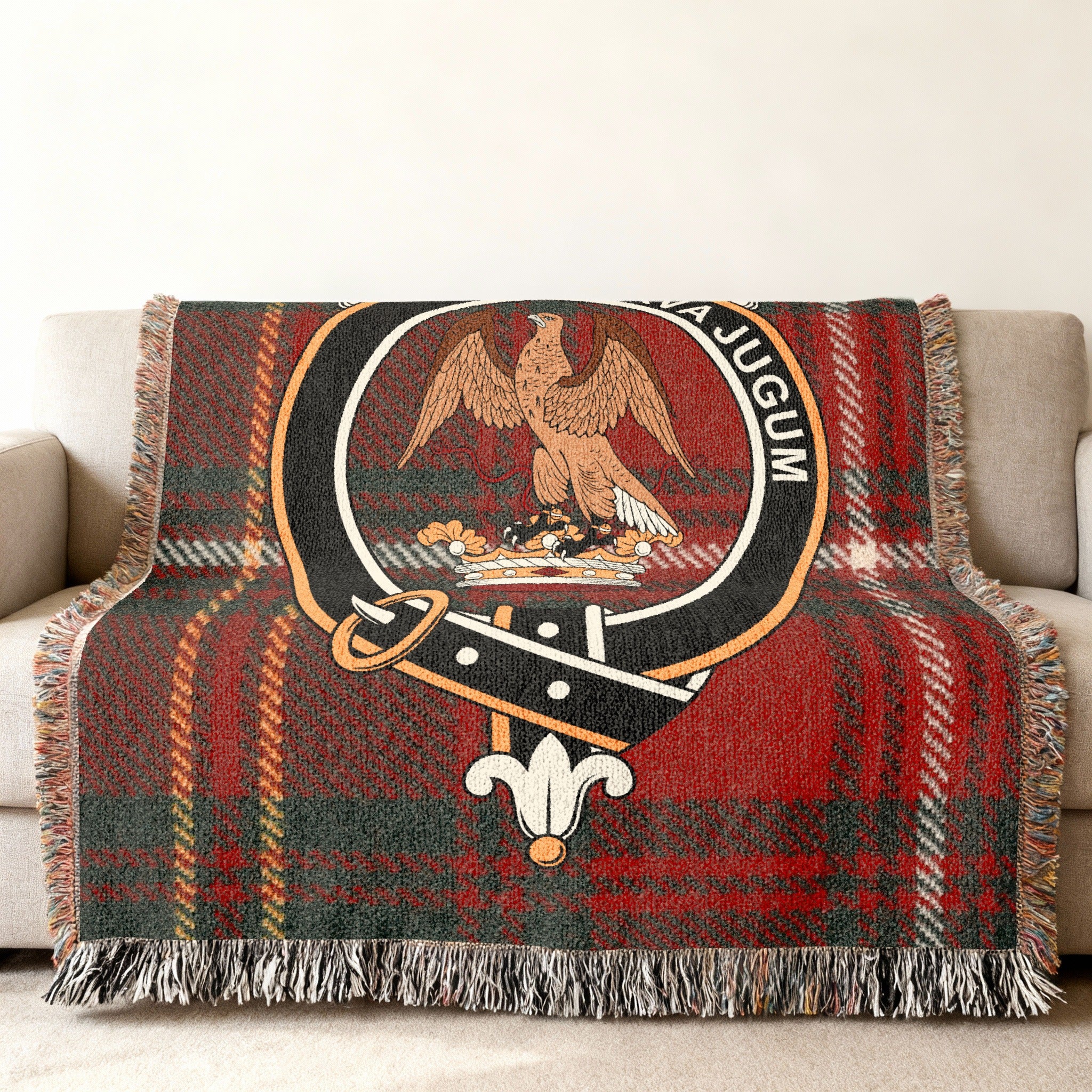 Hay clan tartan woven blanket with crest detail on fringe-edged cotton