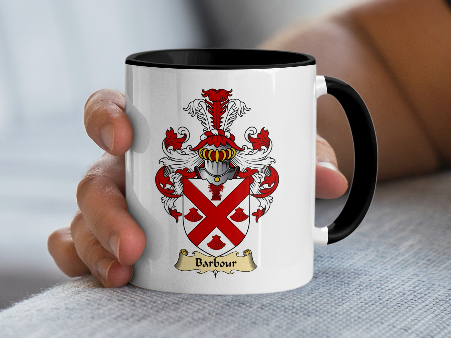 White mug with black interior displaying the Barbour family crest.