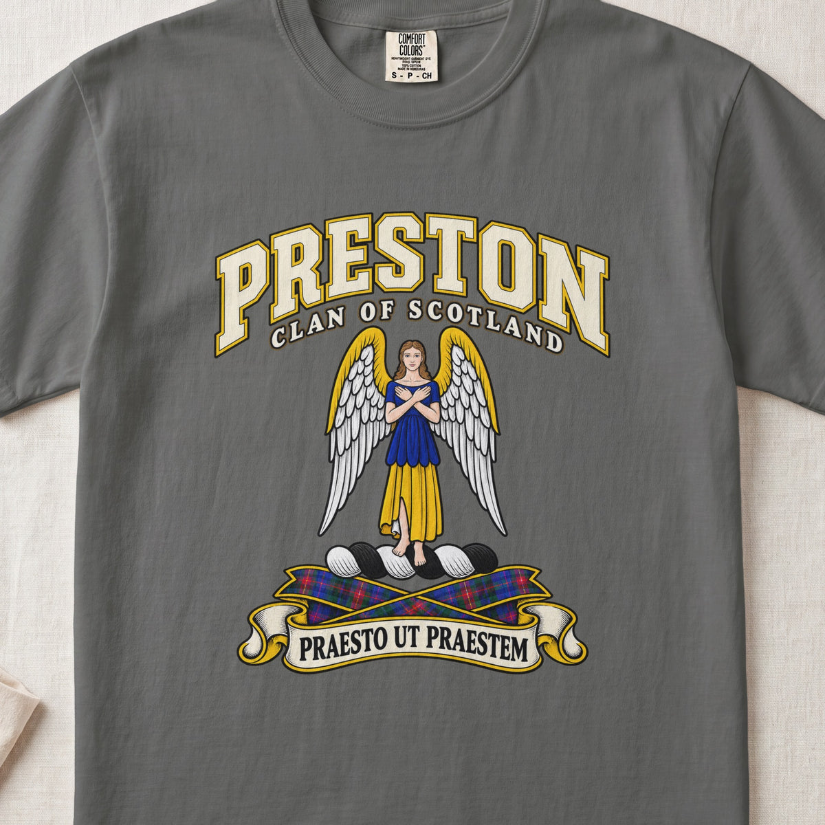 Preston Scottish clan T-shirt in Pepper, front view with a winged figure in blue and gold clothing and motto banner.