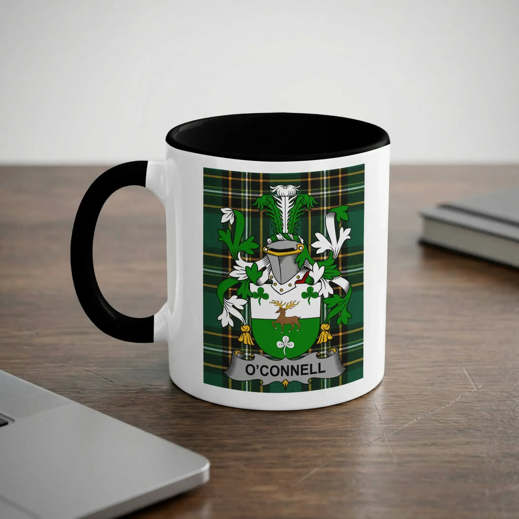 White mug with black rim featuring the O'Connell family crest on a plaid background.