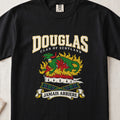 Douglas graphic T-shirt in Black, front flat lay showing varsity lettering and green salamander amid gold and red flames.