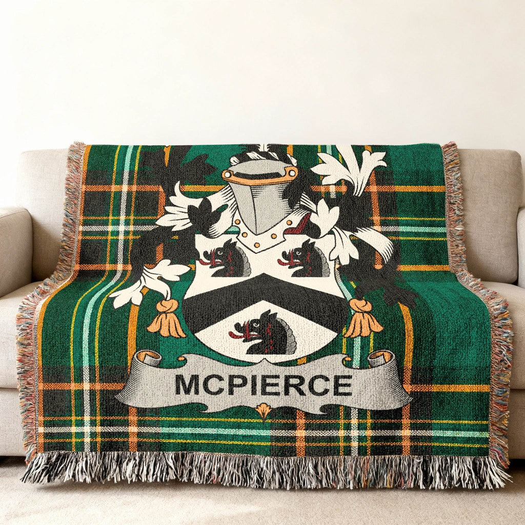 Green tartan throw blanket with MCPIERCE family crest.